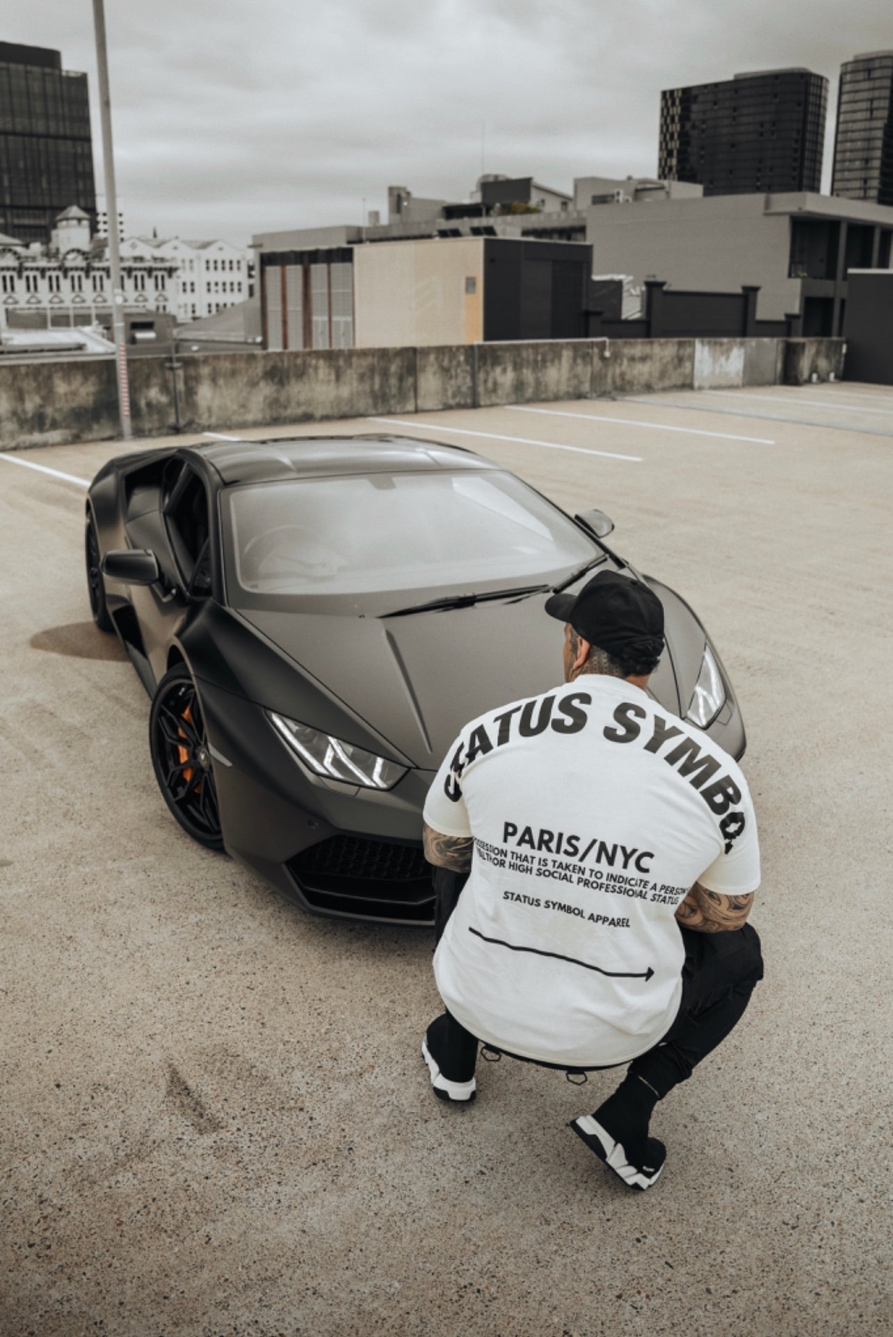 White Status Symbol Logo T-Shirt