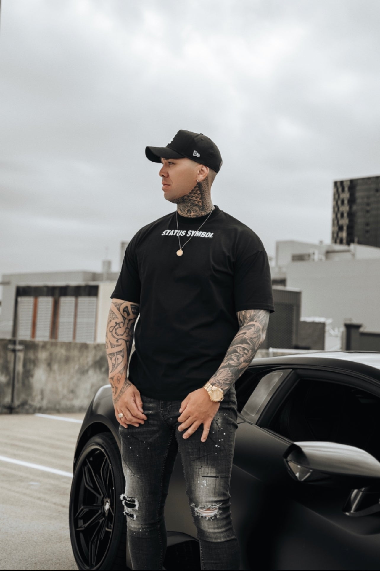 Black Status Symbol Logo T-Shirt